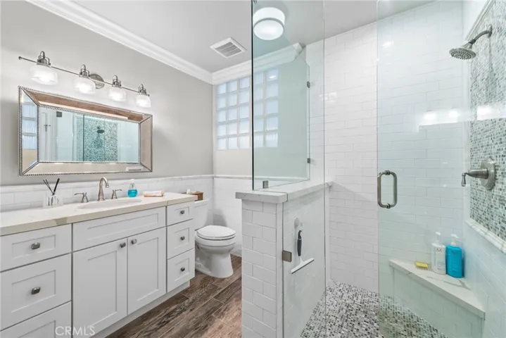 Alternate view of primary bathroom and walk-in shower