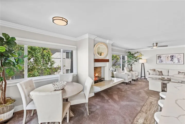 Centrally-located gas fireplace provides a cozy ambiance