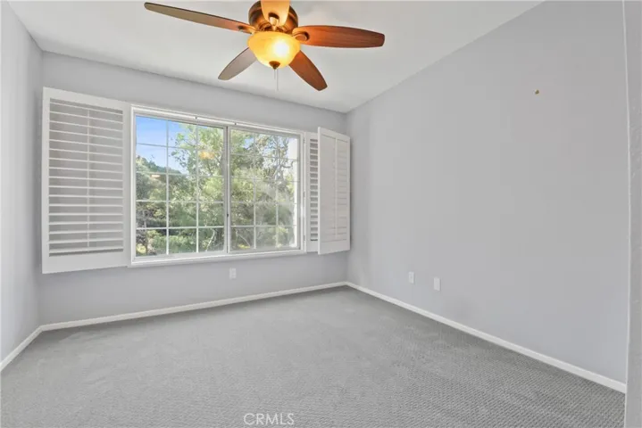 Guest bedroom with new carpet.