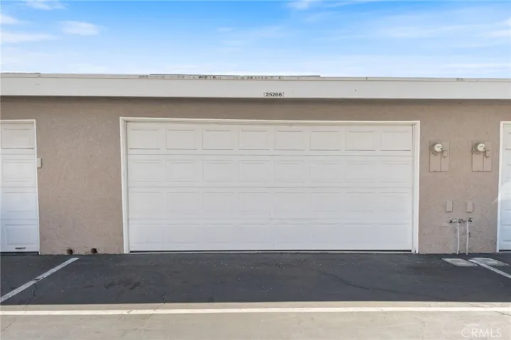 Detached 2 car garage with additional assigned parking