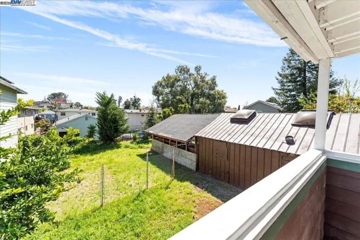 Back deck overseeing backyard