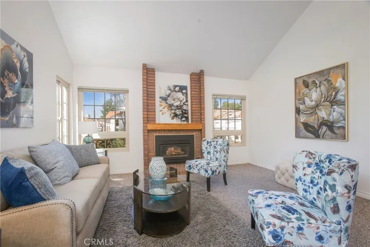 Living Room with Fireplace, 4 windows that bring in lots of natural light