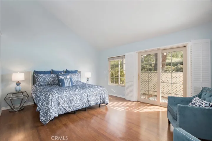 Primary Bedroom #1 with sliding door access to patio