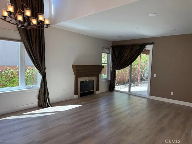 Family Room with doors out to the Covered Patio and Backyard