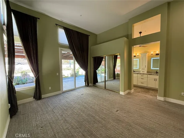 Primary Bedroom with Sliding doors to Backyard