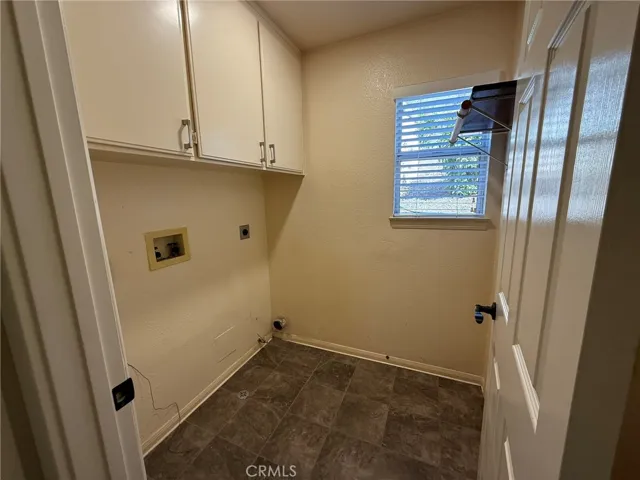 Downstairs Laundry with understairs Storage Closet