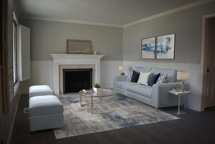 Cozy living room with stately wood-burning fireplace