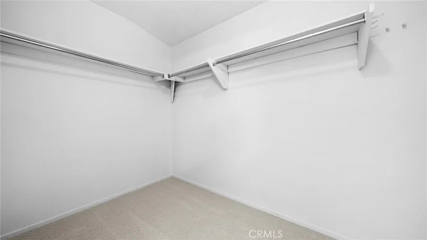 Primary Walk-In Closet.