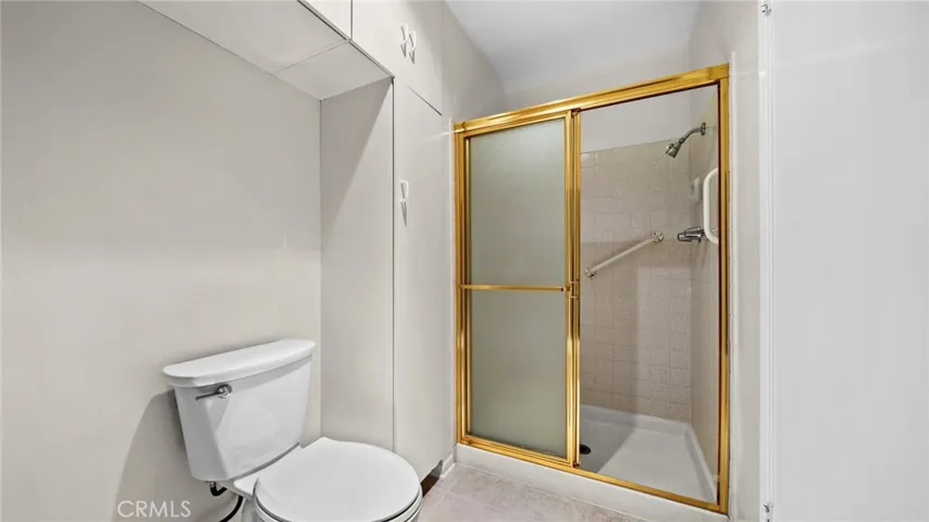 Primary Shower and Storage Area.