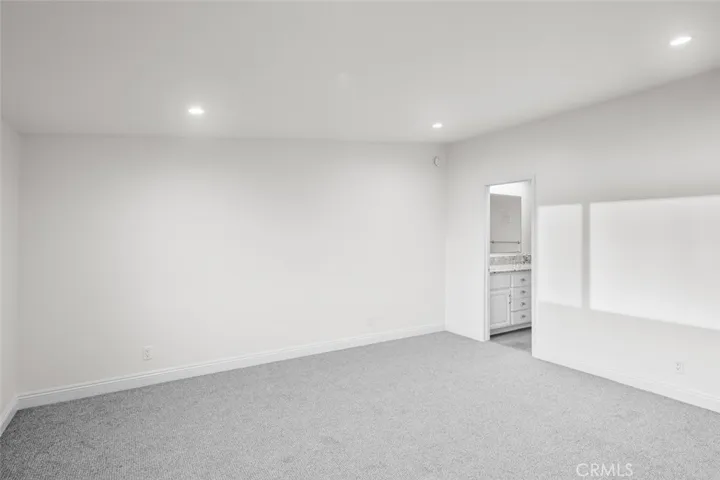 Primary bedroom with en-suite bathroom.