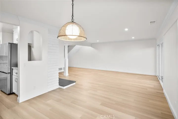 Dining room with crisp newly painted walls.