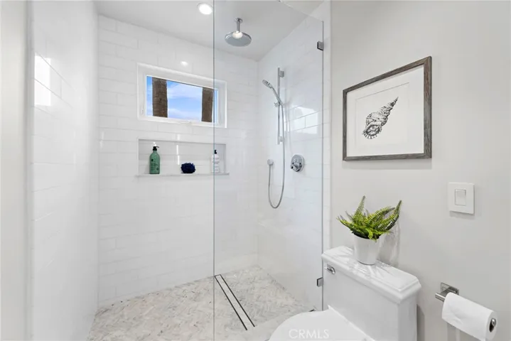 Primary walk-in shower.