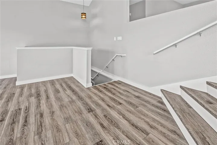 From the living room, continue downstairs to...