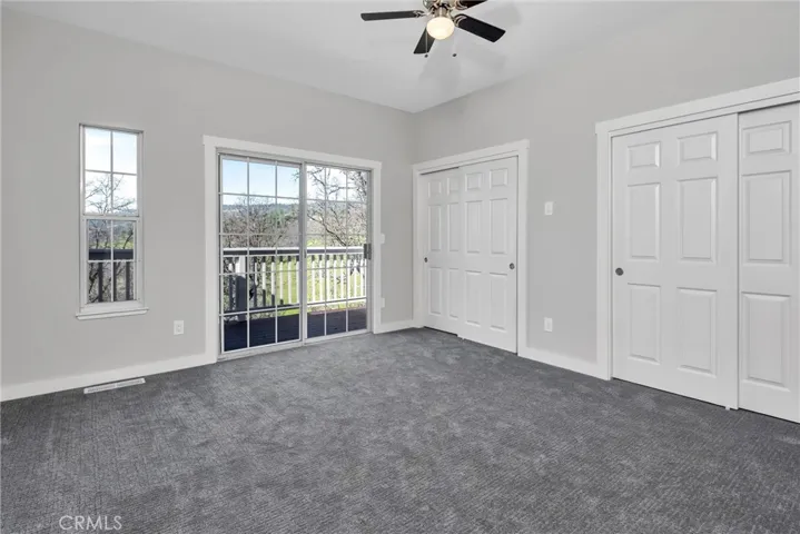 Primary bedroom opens out to deck.