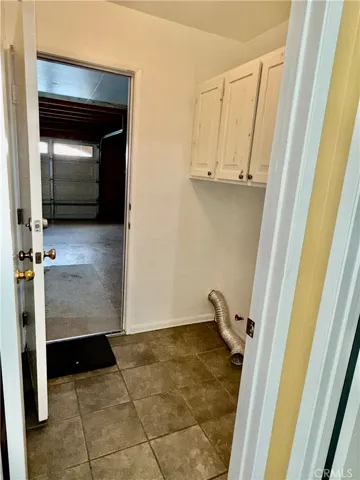LAUNDRY ROOM AND GARAGE DOOR