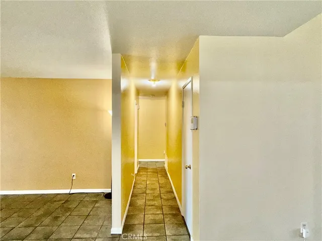 HALLWAY FROM FAMILY ROOM TO RESTROOM