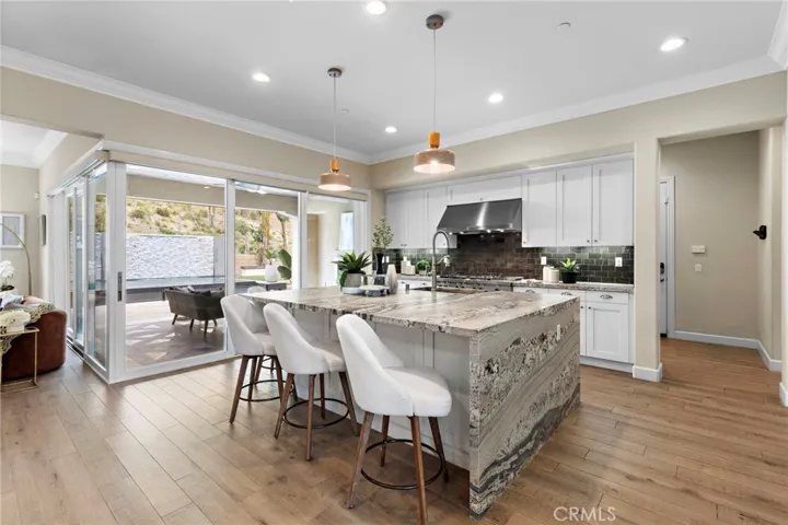 A seamless blend of indoor-outdoor living is achieved with a California Room
