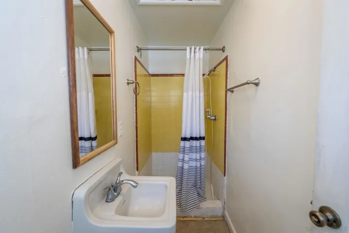 En suite bathroom in primary bedroom.
