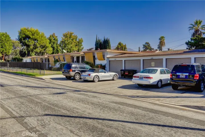 View from 7276 Jackson Place, Garage and driveway parking for each unit