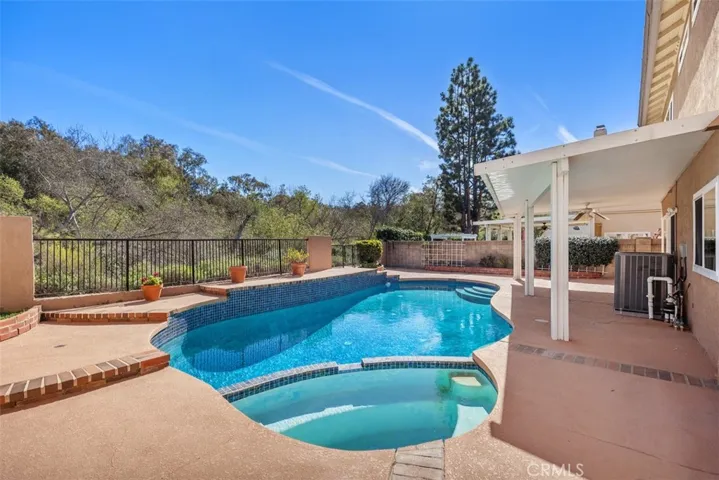 Wow!!  Beautiful pool & spa with amazing view of Serrano Creek area.
Aluminum patio cover, new A/C unit & paid for solar!!