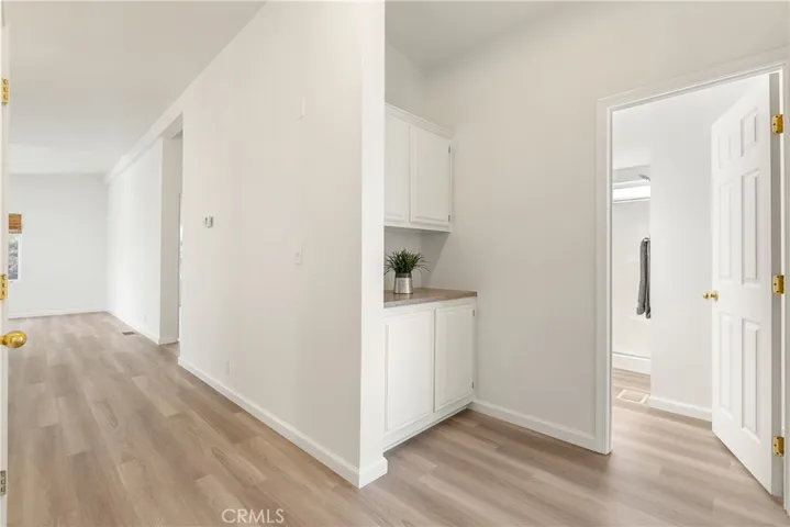 Built-in cabinetry finishes out the separate guest quarters which feature a second bedroom and second full bathroom