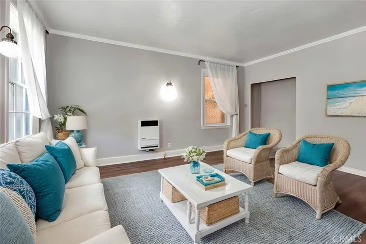 Living area virtually staged (furniture size not accurate)