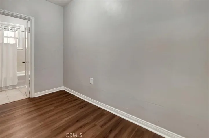 Large closet outside bedroom and bathroom