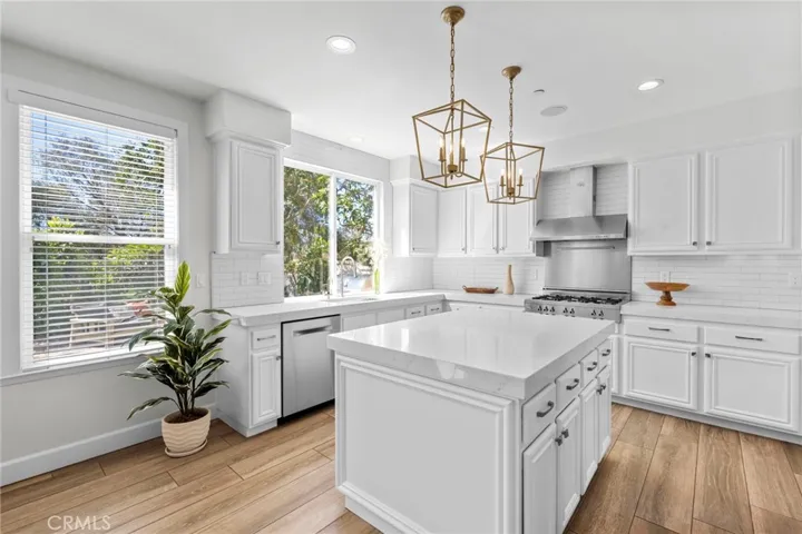 New cabinets, quartz, countertops, custom lighting