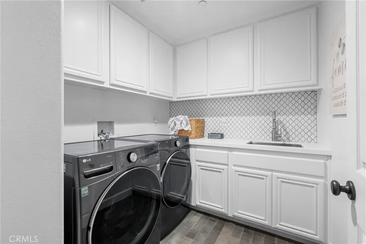 large laundry room upstairs