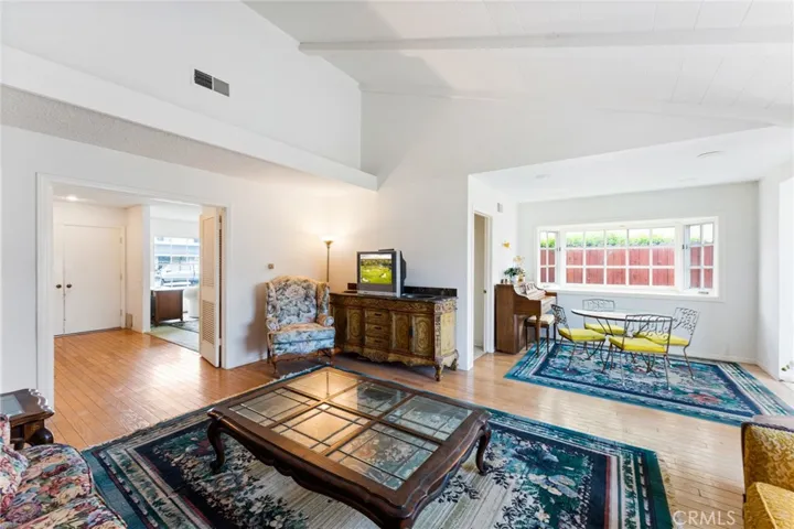 Another view of the entry, family room and dining room