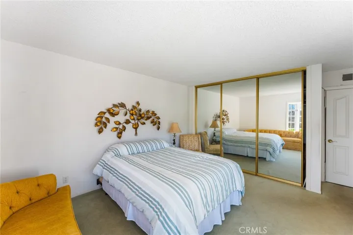 Primary bedroom with spacious bathroom
