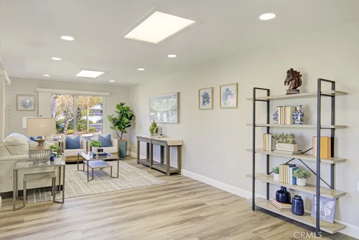 Enormous multi-purpose bonus room measuring approximately 300 sq. ft. can serve a variety of functions including TV room, home office, arts and crafts studio or workout room.