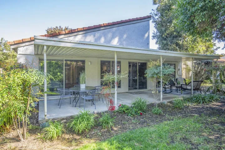 Large covered rear patio is ideal for year-round outdoor entertaining, dining or relaxing.