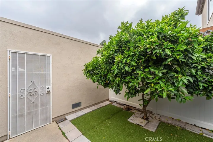 View of patio with access  to garage