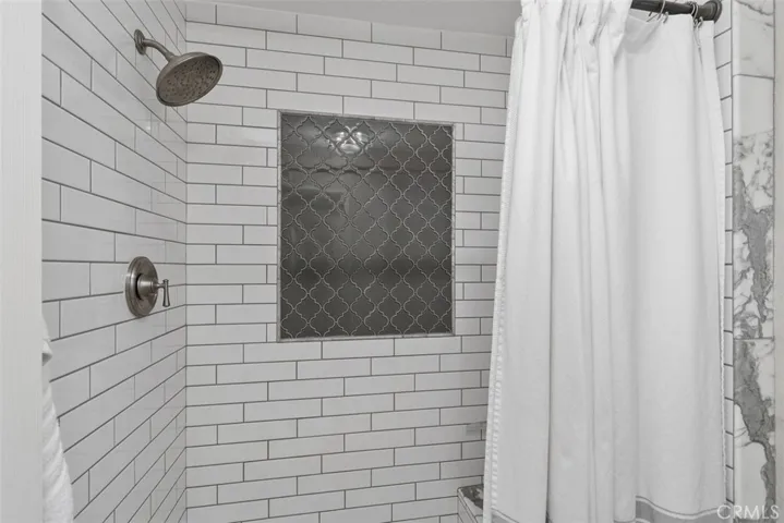 Large walk in shower in Primary Bedroom.