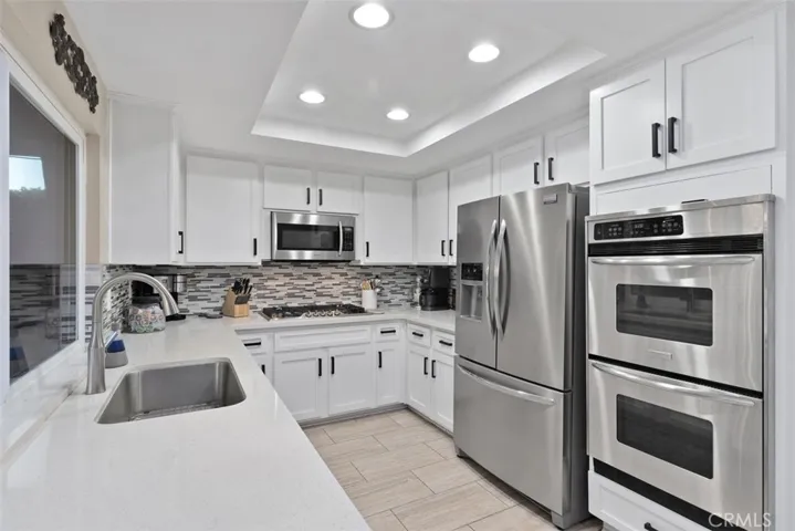 Beautiful remodeled kitchen with double oven.