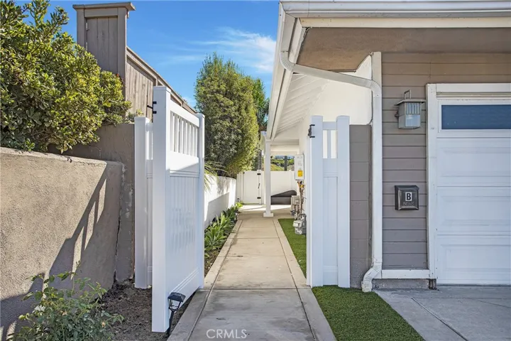 Private Entrance with newer Vinyl Fencing!
