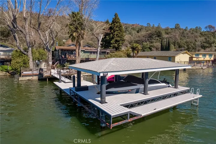 Private power boat dock, swim platform and 2 jet ski bunks