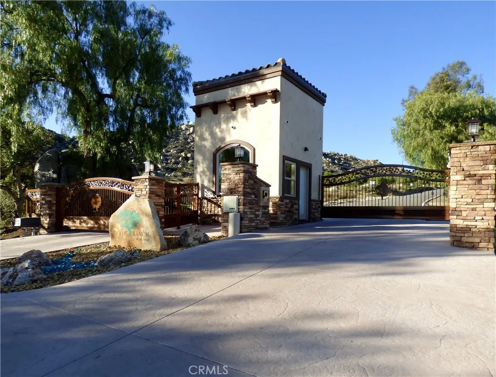 Prestigious & impressive gated main entrance with high tech security cameras.