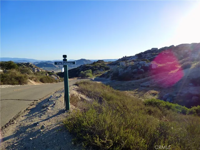 Via Bonito Road at the end of the cul-de-sac.  Great privacy and serenity.