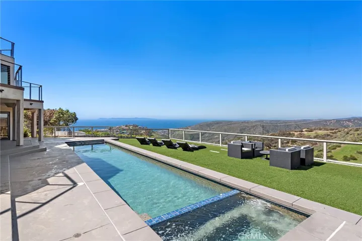 Take a moment to refresh as the sun shimmers on the Pacific Ocean and slowly sets beyond Catalina Island, entertain poolside while guests enjoy unobstructed canyon and evening-light vistas, and decompress in a home that enhances gracious living.