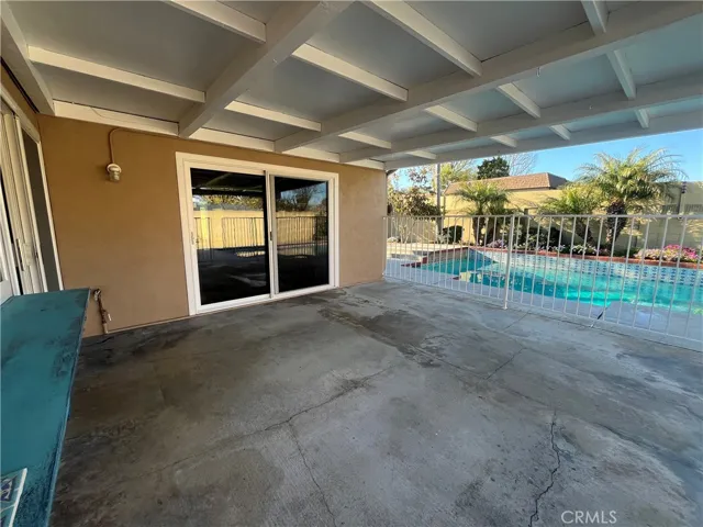 Two exits to the backyard - from  the family room  and from the primary suite