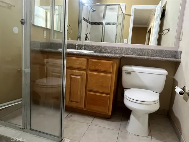 Primary suite bath with walk-in shower granite counter tops