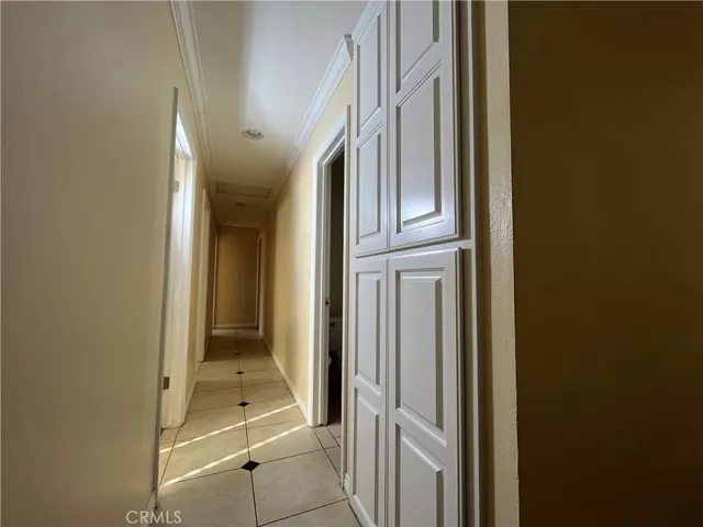 long hallway 4 bedrooms