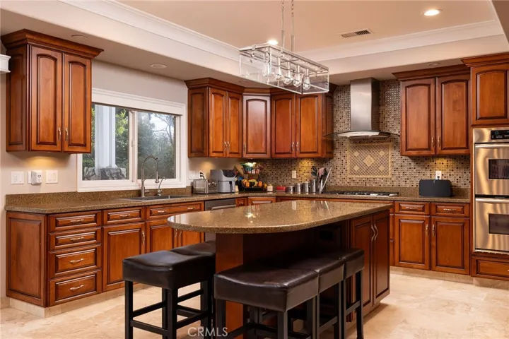 Kitchen with eat in bar