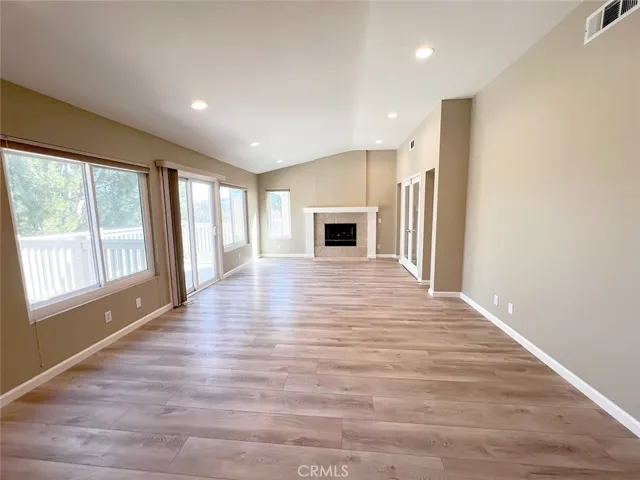 Expansive primary suite with fireplace