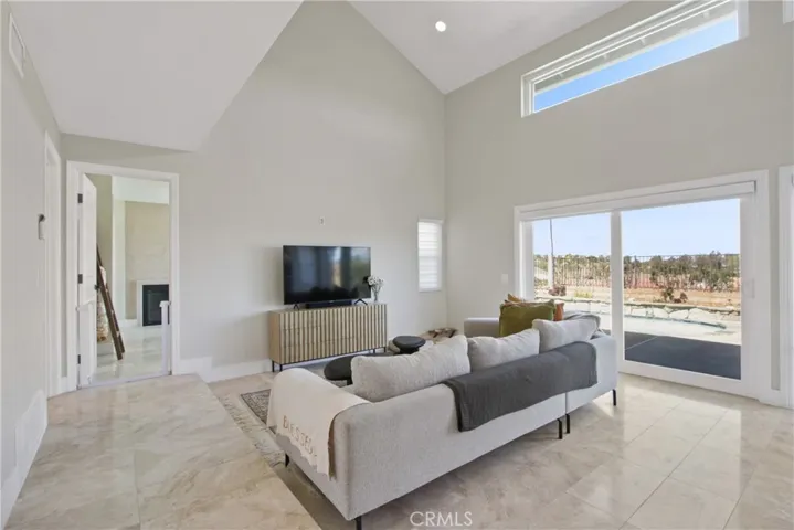Living Room with Vaulted Ceilings and Forever View