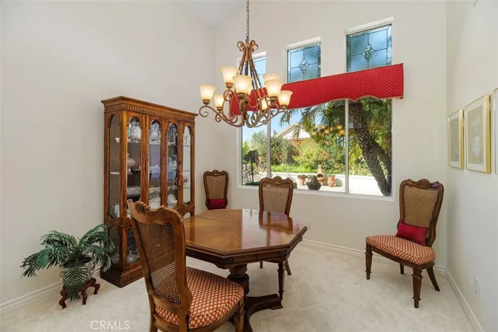 The Dining Room has views of the Backyard.