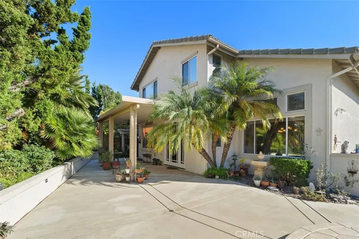 Enjoy Added Privacy with Mature Landscape that is Easy to Maintain.