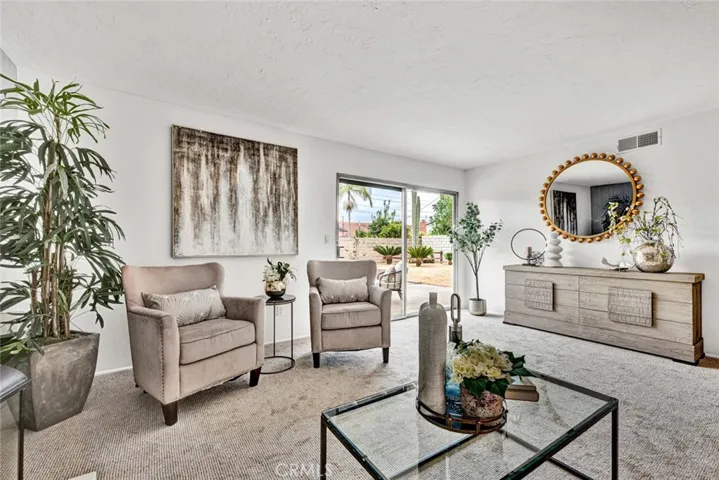 Living Room with Slider Opening to Wonderful Private Backyard